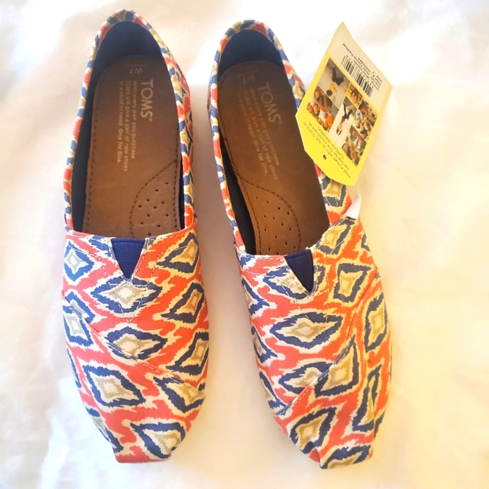 Brand new Toms,  size 7